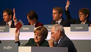 ERDOĞAN'A ELEŞTİRİ,TÜRKİYE İLE DEVAM KARARI