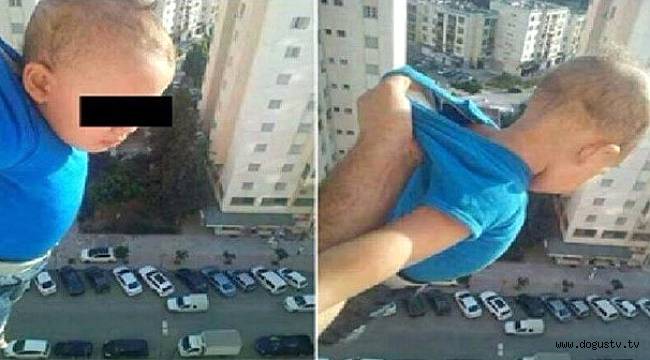 Baba,2 Yaşındaki Oğlunu 15 Kattan Sarkıtıp Sosyal Medyada Paylaştı.