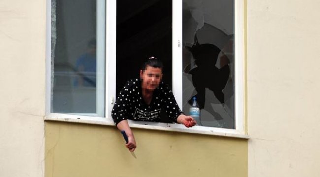 Bunalıma giren kadın evi ateşe verip, bileklerini kesti