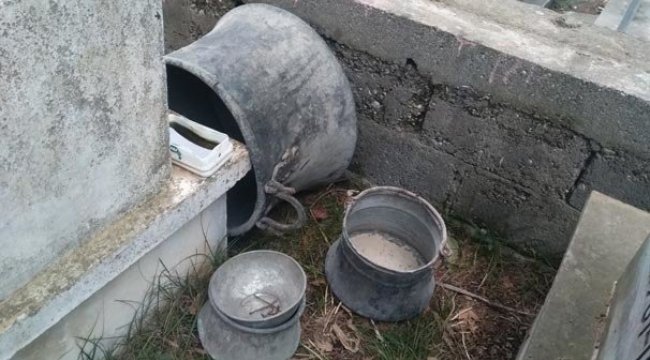 Çalınan bakır kazanlar mezarlıkta bulundu