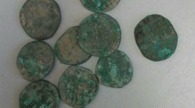 Aranan terörist tarihi eserle yakalandı