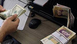 İran, Riyal'i dolara karşı sabitledi