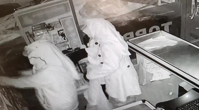 Kadın elbiseli hırsızlar kamerada