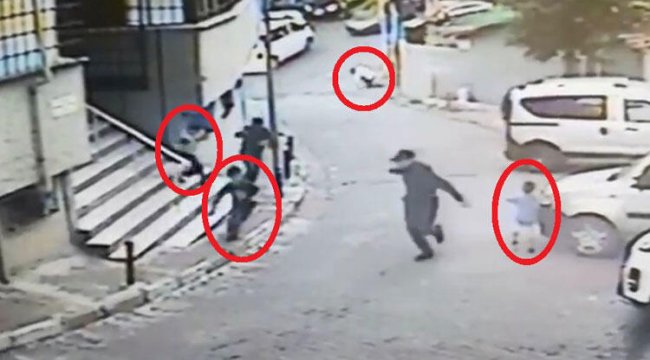 Sokak ortasında, çevredeki çocuklara rağmen silahlı çatışma