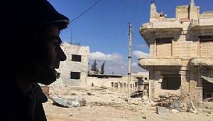 DHA ekibinin zor anları! Çekim sırasında bombardıman başladı