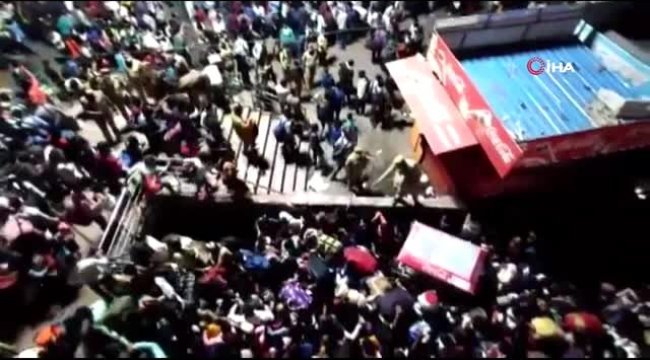- Hindistan'da evine dönmek isteyen binlerce işçi, otobüs terminalinde bekletildi