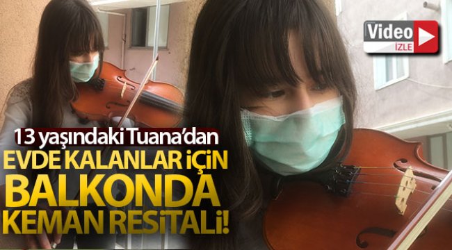 Evde kalanlar için balkonda keman resitali