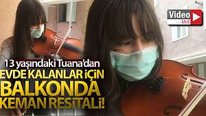 Evde kalanlar için balkonda keman resitali