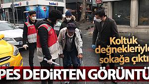 İstanbul’da koltuk değnekleriyle dışarıya çıkan yaşlı adam 'pes' dedirtti