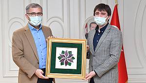 DR.MEHMET GÜLLÜOĞLU BAŞKAN HİLMİ TÜRKMEN’İ ZİYARET ETTİ