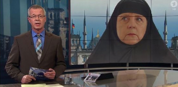 Merkel e çarşaf giydirdiler