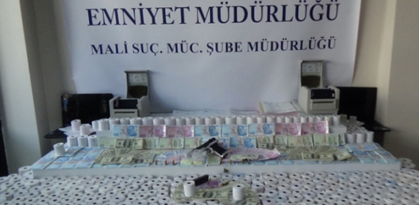 Sahte belge ve para basan şebekeye polis operasyonu